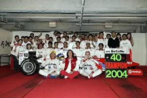 Formula Nippon Championship: Richard Lyons celebrates winning the 2004 Formula Nippon Championship with his DoCoMo