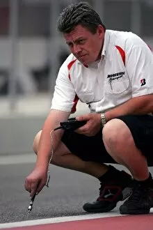 Images Dated 17th February 2009: Formula One Testing: Bridgestone Engineer takes track temperature