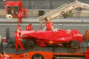 Images Dated 15th November 2007: Formula One Testing: The car of Luca Badoer Ferrari Test Driver is brought back to the pits after