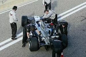 Images Dated 25th November 2003: Formula One Testing: David Coulthard makes the debut for the new McLaren Mercedes MP4 / 19