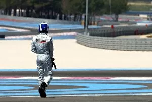 Images Dated 16th May 2002: Formula One Testing: David Coulthard walks away after spinning his McLaren