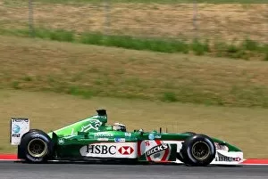 Images Dated 27th June 2002: Formula One Testing: Eddie Irvine test the revised Jaguar R3B