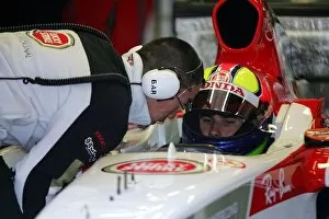 Images Dated 25th November 2004: Formula One Testing: Enrique Bernoldi BAR Test Driver talks with a BAR engineer