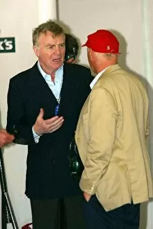 Images Dated 22nd March 2002: Formula One Testing: FIA President Max Mosley chats with Jaguar Team Principal Niki Lauda