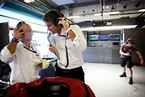 Images Dated 19th November 2010: Formula One Testing: Hispania F1 Racing Team Engineers and Pirelli Engineers