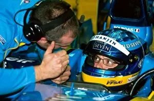 Images Dated 17th December 2002: Formula One Testing: International F3000 champion Sebastien Bourdais is briefed by an engineer