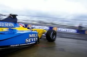 Images Dated 20th February 2003: Formula One Testing: Jarno Trulli Renault R202 leaves the pit garage