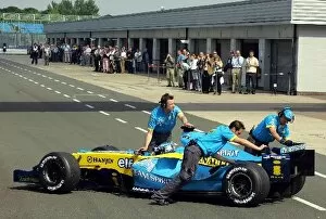 Images Dated 2nd June 2004: Formula One Testing: Jarno Trulli Renault R24 stops in front of the Renault guests
