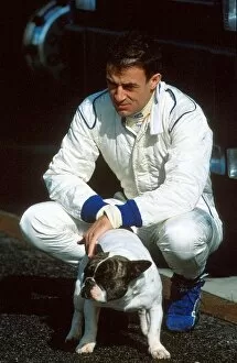 Images Dated 12th February 2001: Formula One Testing: Jean Alesi Prost Ferrari AP04 with his pet dog