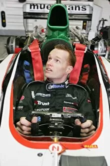Images Dated 25th November 2004: Formula One Testing: Jeffrey van Hooydonk has a Minardi seat fitting