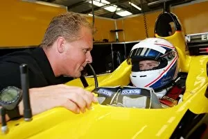 Images Dated 13th September 2005: Formula One Testing: Johnny Herbert Jordan Sporting Relations Manager talks with Anthony Davidson