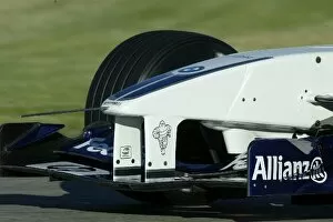 Images Dated 26th November 2002: Formula One Testing: Juan Pablo Montoya tests the BMW Williams FW24 with a device on the front nose