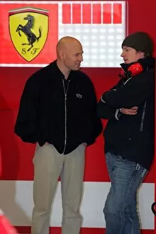 Images Dated 7th December 2006: Formula One Testing: Kimi Raikkonen Ferrari in the Ferrari garage with his trainer Mark Arnell