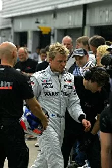Images Dated 3rd June 2004: Formula One Testing: Kimi Raikkonen McLaren suffers a problem with the new McLaren Mercedes MP4