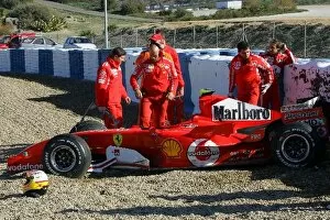 Images Dated 7th December 2005: Formula One Testing: Luca Badoer Ferrari after he crashed into a tyre wall