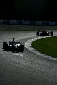Team Mates Gallery: Formula One Testing: Luciano Burti Ferrari F2002 and Luca Badoer Ferrari F2002 chase each other