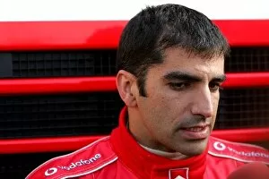 Images Dated 23rd November 2004: Formula One Testing: Marc Gene Ferrari talks with the media