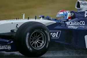 Images Dated 9th December 2003: Formula One Testing: Marc Gene Williams BMW FW25 in very wet conditions at Jerez