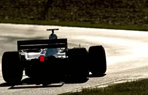 Images Dated 16th December 2002: Formula One Testing: A McLaren Mercedes MP4 / 17 in the low Spanish winter sun