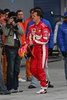Images Dated 15th December 2005: Formula One Testing: Michael Schumacher walks back to his pit garage after a minor accident on his