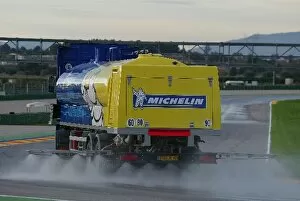 Transporter Collection: Formula One Testing: A Michelin transporter wets the circuit in preparation for tyre testing