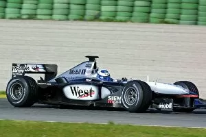 Images Dated 12th February 2001: Formula One Testing: Mika Hakkinen tests the McLaren Mercedes MP4-16 for the first time