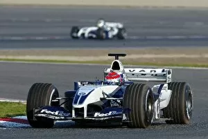 Images Dated 3rd February 2004: Formula One Testing: Nelson Piquet Jnr Williams BMW FW25 leads Ralf Schumacher Williams BMW FW26