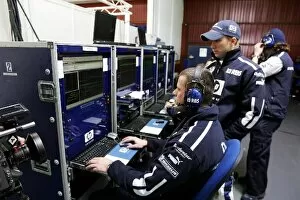 Images Dated 31st January 2005: Formula One Testing: Nick Heidfeld Williams and engineers study telemetry from the Williams FW27