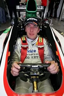 Images Dated 25th November 2004: Formula One Testing: Partick Huisman has a Minardi seat fitting