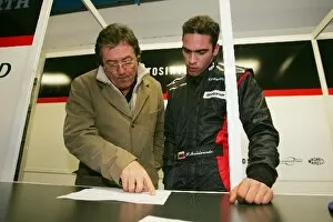 Images Dated 25th November 2004: Formula One Testing: Pastor Maldonado talks with Giancarlo Minardi Minardi Managing Director