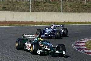 Images Dated 26th January 2002: Formula One Testing: Pedro de la Rosa Jaguar R3 leads Marc Gene BMW Williams FW23 during testing