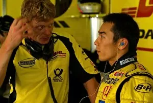 Images Dated 25th June 2002: Formula One Testing: Takuma Sato Jordan Honda, right, talks with his physio Martin Whittingham