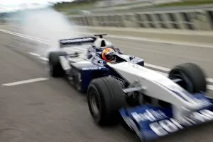 Images Dated 5th April 2002: Formula One Testing: Test driver Antonio Pizzonia blows the BMW engine in his Williams FW24