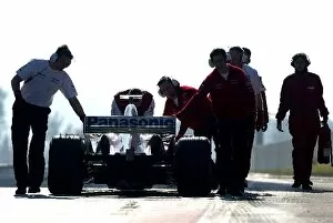 Images Dated 3rd February 2004: Formula One Testing: The Toyota Team recover their stranded car