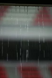 Images Dated 1st May 2007: Formula One Testing: Water droplets drip off a roof