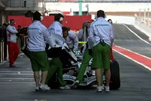 Images Dated 17th April 2008: Formula One Testing: Front wing change for Jenson Button Honda RA108