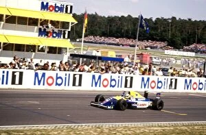 Heidelberg Gallery: Formula One World Championship 1991: Nigel Mansell Williams FW14 celebrates his race victory at