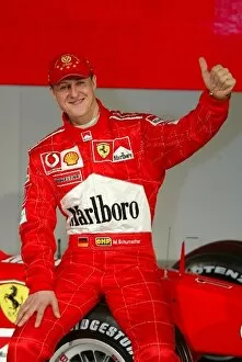 Images Dated 7th February 2003: Formula One World Championship: 2002 F1 World Champion Michael Schumacher poses with the new