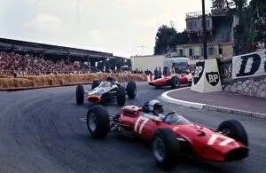 Monaco Gallery: Formula One World Championship: 2nd placed Lorenzo Bandini Ferrari 1512 leads race winner Graham Hill BRM P261