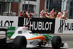 Images Dated 10th June 2010: Formula One World Championship: Adrian Sutil Force India F1 VJM03 passes his team at the end of