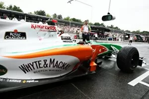 Formula One World Championship: Adrian Sutil Force India F1 VJM03 tests a new pit stop light system