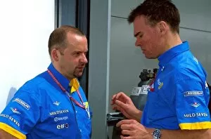 Engineer Collection: Formula One World Championship: Alan Permane right, Renault race engineer to Jarno Trulli speaks