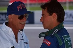 Images Dated 22nd February 2001: Formula One World Championship: Alessandro Nannini talks with Ford boss Michael Kranefuss