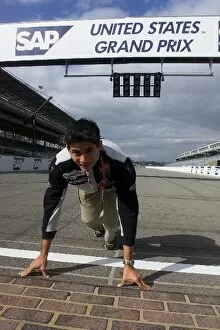 Images Dated 28th September 2001: Formula One World Championship: Alex Yoong European Minardi on the famous yard of bricks at