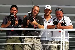 Formula One World Championship: Andrew Ferraro Photographer with Mark Thompson Photographer