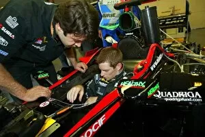 Images Dated 15th August 2002: Formula One World Championship: Anthony Davidson, acquainting himself with the Minardi Asiatech PS02