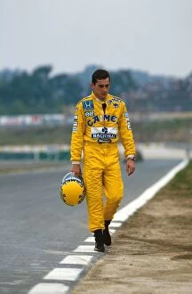 1987 Collection: Formula One World Championship: Ayrton Senna Lotus 99T walks back to the after a practice spin