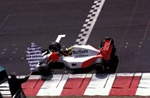 Images Dated 30th March 2004: Formula One World Championship: Ayrton Senna McLaren Honda MP4 / 7A crosses the line at the end of