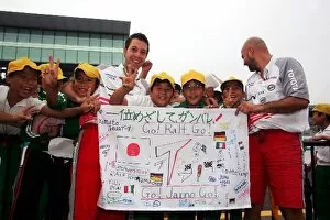 Images Dated 5th October 2006: Formula One World Championship: Banner of support for Toyota by young children