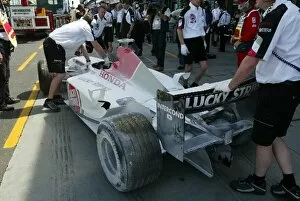 Images Dated 7th March 2003: Formula One World Championship: The BAR 005 of Jacques Villeneuve is returned to the pits